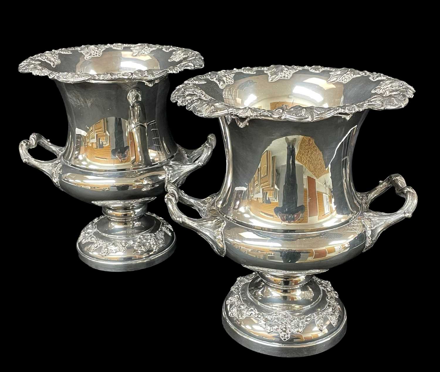 IMPRESSIVE PAIR OF ELECTROPLATED WINE COOLERS, of classical urn form with twin handles and decorated