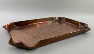 ARTS & CRAFTS COPPER GALLERY TRAY, decorated in the manner of J & F Poole (Cornwall) with hammered