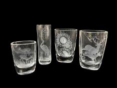 FOUR STRATHEARN ENGRAVED GLASS VASES, one decorated with sunflowers, the others, deer, one by Gordon