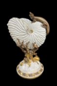 ROYAL WORCESTER NAUTILUS SHELL VASE, on gilded coral and shell support, surmounted by a salmander or