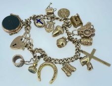 9CT GOLD CURB LINK CHARM BRACELET, having heart shaped padlock, twelve 9ct gold charms, one 15ct