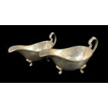 PAIR SILVER SAUCE BOATS, Sheffield 1975, of heavy gauge, with reeded edge on three shell scrolled