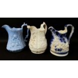 THREE GOOD YNYSMEUDWY MOULDED POTTERY JUGS comprising white glazed example with gilt scrolls to