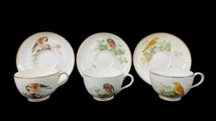 THREE ROYAL WORCESTER HAND-PAINTED CUPS & SAUCERS, decorated with Brambling, Yellow Bunting and