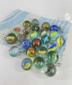 COLLECTION VINTAGE GLASS MARBLES, including 3 scrambled marbles and 21 cats eyes marbles (24)