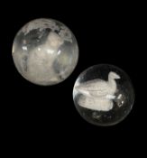 TWO RARE SULPHIDE GLASS MARBLES, one large containing a seated cat 37mm diam, a smaller contining