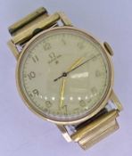 GENT'S OMEGA 9CT GOLD CASED WRISTWATCH - with rolled gold expanding bracelet, the dial set with