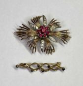 9CT GOLD BROOCHES (2) - to include a ruby and paste set yellow and white gold floral brooch, 5.5 x