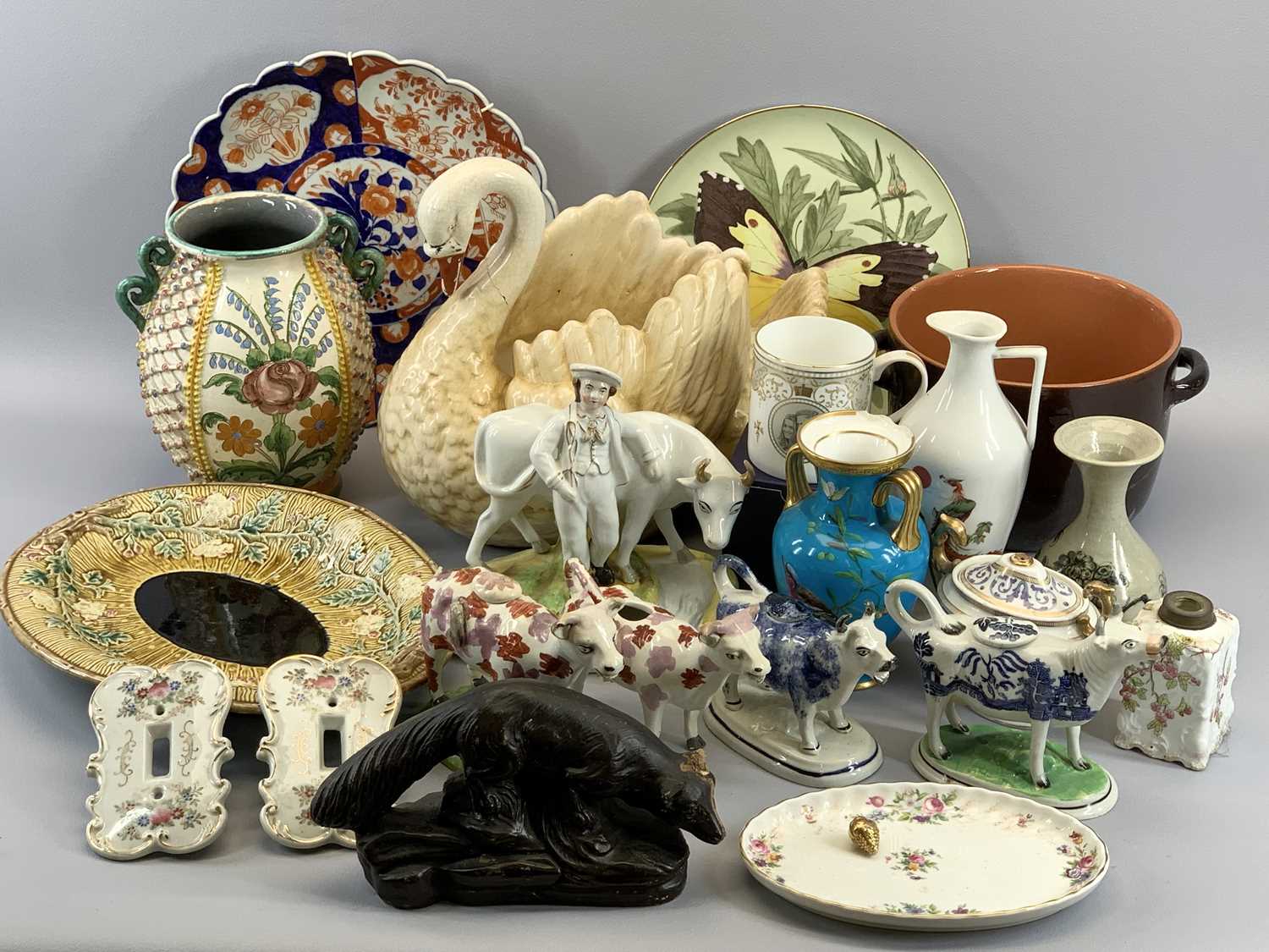 CHINA ASSORTMENT - to include Majolica type plate, cow creamers, a swan planter, ETC