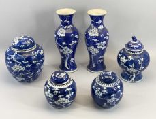 CHINESE PRUNUS BLOSSOM TYPE DECORATED ASSORTMENT - to include a pair of vases, 30cms tall, a pair of