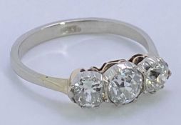 PLATINUM THREE STONE DIAMOND RING - size K, approx 1 carat in total, 2.6grms