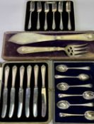 SILVER CASED TEASPOON SET, two other cased butter knives set with silver handles, plated dessert
