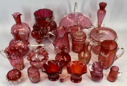 CRANBERRY GLASS - an assortment of various vases and bowls, also, a quantity of paperweights and