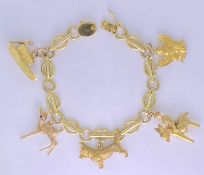 18CT GOLD BRACELET - with four 9ct gold charms and one 14ct gold charm, 46.6grms