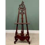 REPRODUCTION MAHOGANY ORNATELY CARVED EASEL/STAND - 175 x 64cms