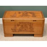 A CHINESE LIGHT WOOD FINISH CARVED CAMPHORWOOD CHEST - 48cms H, 92cms W, 46cms D