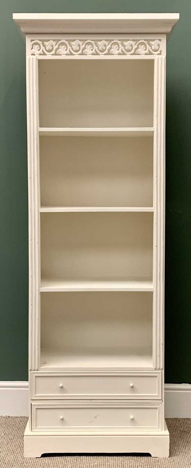 A MODERN PAINTED PINE NARROW BOOKCASE - over two base drawers, 181cms H, 61cms W, 37cms D