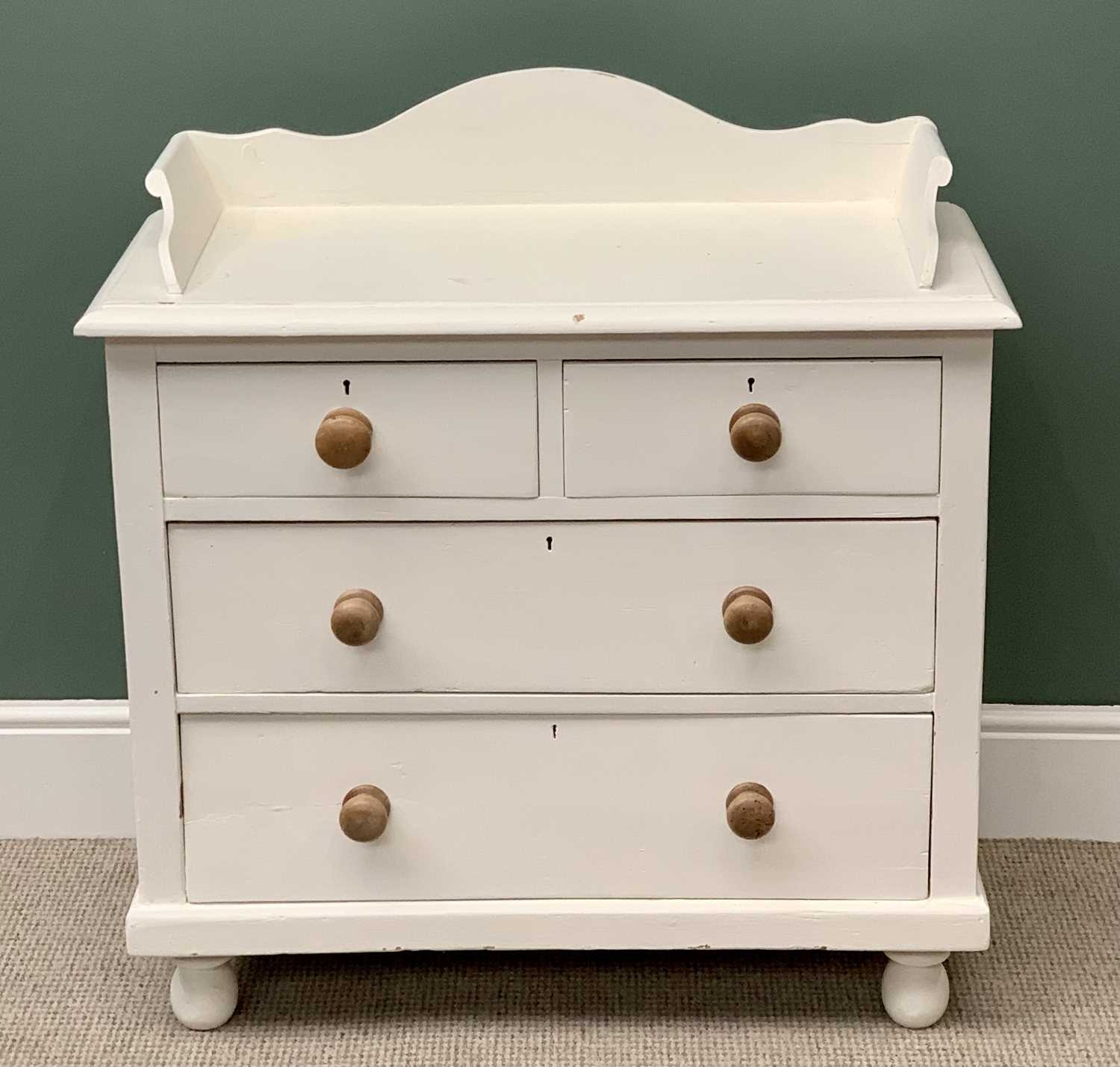 A VINTAGE PINE WASHSTAND CHEST - with two short over two long drawers having turned wooden knobs,