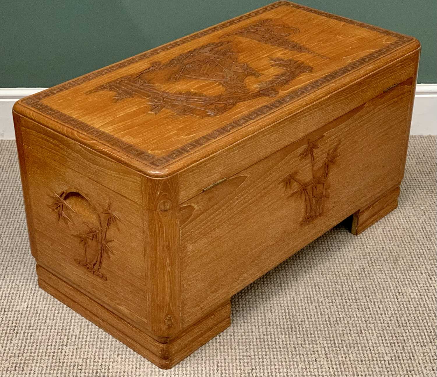 A CHINESE LIGHT WOOD FINISH CARVED CAMPHORWOOD CHEST - 48cms H, 92cms W, 46cms D - Image 4 of 4