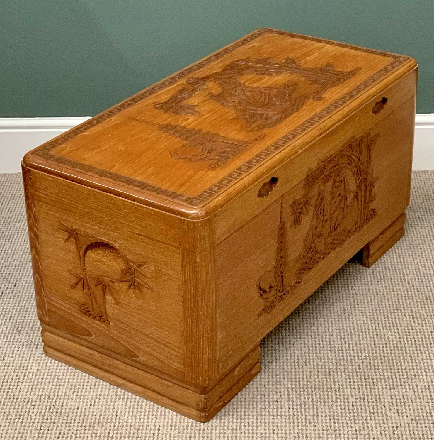 A CHINESE LIGHT WOOD FINISH CARVED CAMPHORWOOD CHEST - 48cms H, 92cms W, 46cms D - Image 2 of 4