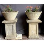 GARDEN STONEWARE - a pair of good size circular planters on excellent square section column bases,