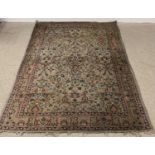 EASTERN STYLE WOOLLEN CARPET, blue/grey ground with wide pink border and repeat traditional floral