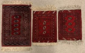 RUGS - three prayer type mats, all red ground, one labelled "Kirman Shah", 91 x 62cms the largest