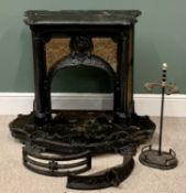 CIRCA 1900 CAST IRON BEDROOM FIREPLACE, incorporated hearth with shaped detail repeated to the