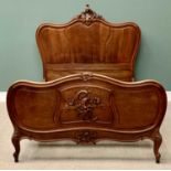 ANTIQUE FRENCH 4ft 6ins MAHOGANY BED with carved detail, metal sprung base, 165cms H, 171cms W,