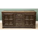 ANTIQUE SIDEBOARD - heavily carved oak with three central drawers flanked by two cupboard doors,