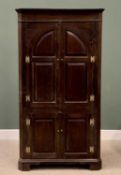 19th CENTURY OAK FLOORSTANDING CORNER CUPBOARD, a substantial example with arched and fielded front,