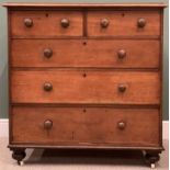 VICTORIAN MAHOGANY CHEST of two short over three long drawers with turned knobs and on bun feet