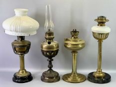 OIL LAMPS - mixed group of four brass oil lamps, one with shade, the tallest 51cms high.