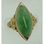 18CT GOLD JADE RING - the ellipse shape stone measuring 21mm x 10mm, slightly cabochon and top