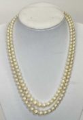 DOUBLE STRAND GRADUATED CULTURED PEARL NECKLACE with 9ct white gold clasp and four pairs of pearl