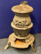 VINTAGE TYPE POT BELLY CAST IRON SOLID FUEL BURNER - on three splayed feet, 76cms overall H, 54cms