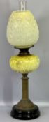 OIL LAMP - Victorian with relief moulded glass font on a brass column and black pottery base