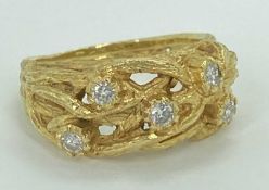 18CT GOLD 5 STONE DIAMOND SET RING - fashioned as openwork entwined branches, Size M, 7.2grms