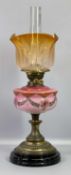 OIL LAMP - Victorian with decorative pink milk glass font on a lacquered brass column and circular