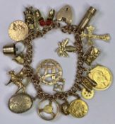 EXCELLENT 9CT GOLD CHARM BRACELET - with padlock clasp holding 20 various charms to include a 1914
