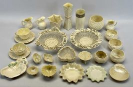 BELLEEK CHINA - a collection of 26 pieces including cups and saucers, baskets, pin trays, jugs,