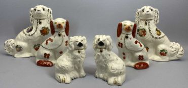 ROYAL DOULTON SEATED SPANIELS, A PAIR - with moulded fur and gilded highlights, impressed on