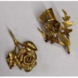 9CT GOLD FLORAL & TWIN LEAF PENDANT, 3.4grms and a 9ct gold thistle and amber stone brooch, 3.3grms