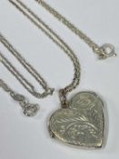 925 BRIGHT CUT SILVER HEART SHAPED LOCKET and fine link chain, total 7.5grms, and a 925 fine link