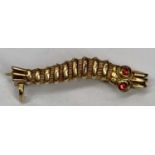 A RARE 9CT GOLD BAR BROOCH WITH RUBY EYES WW2 Caterpillar (silkworm) Club - an informal