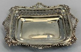 SILVER RECTANGULAR DISH - the reticulated border embossed with flowers and scrolls, London 1895,