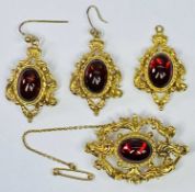 FINE 4 PIECE 9CT ENSEMBLE - scrolled oval brooch, a pair of matching earrings and a pendant, all
