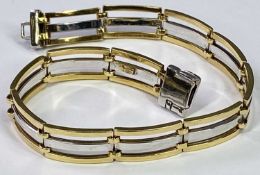 18CT GOLD '750' STAMPED POLSERA GATELINK BRACELET - in yellow and white gold, 19.5cms overall L