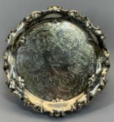 CIRCULAR SILVER TRAY - scroll moulded border and engraved with scrolls and leaves with stag's head