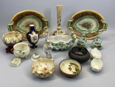 LATE 19TH CENTURY OVAL MAJOLICA TWO-HANDLED DISHES - with leaf moulded decoration, 31 x 23cms, a